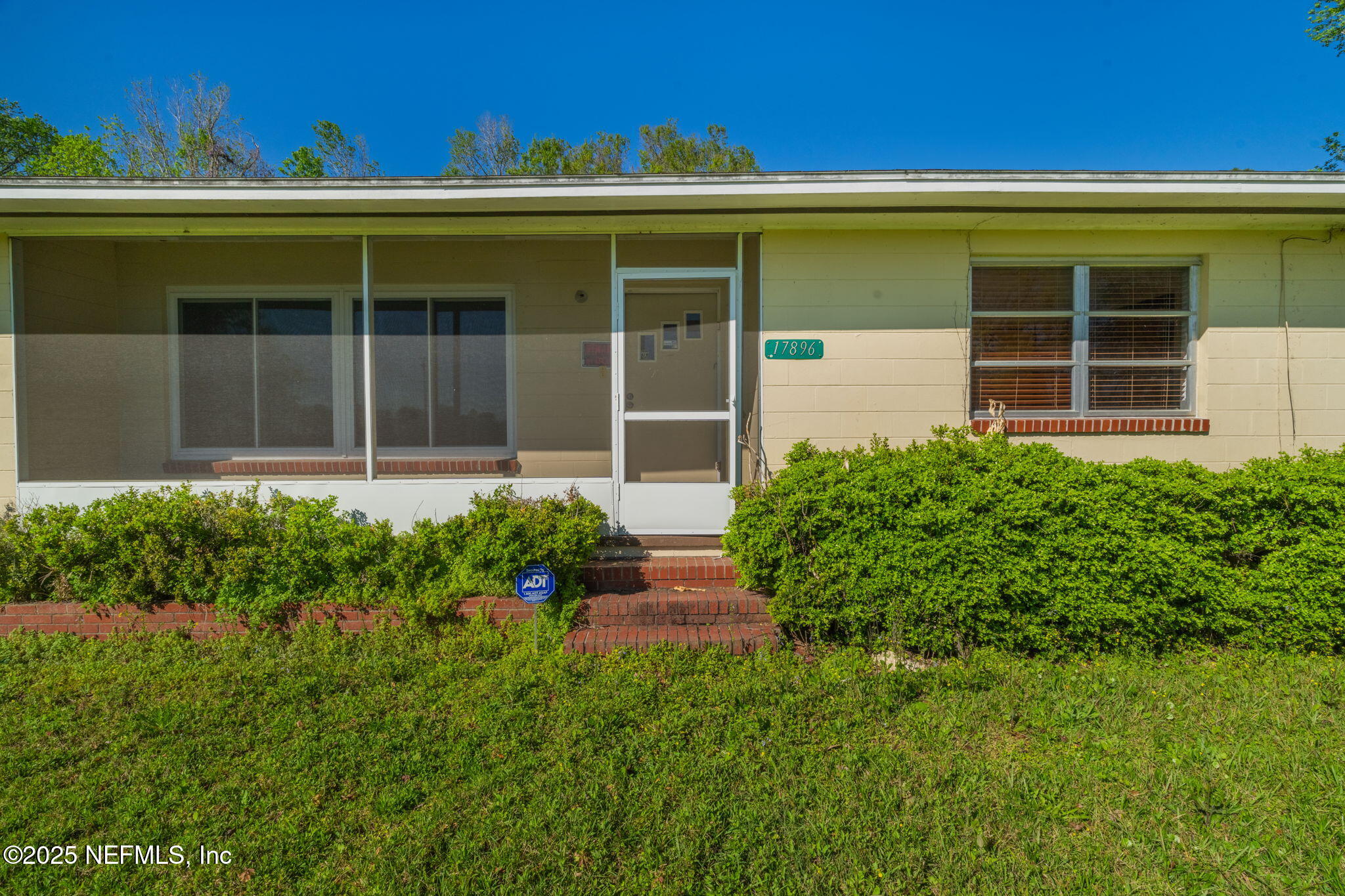 17896 Highway 16 Starke, FL 32091 - Photo 3 of 57 a front view of a house with a yard