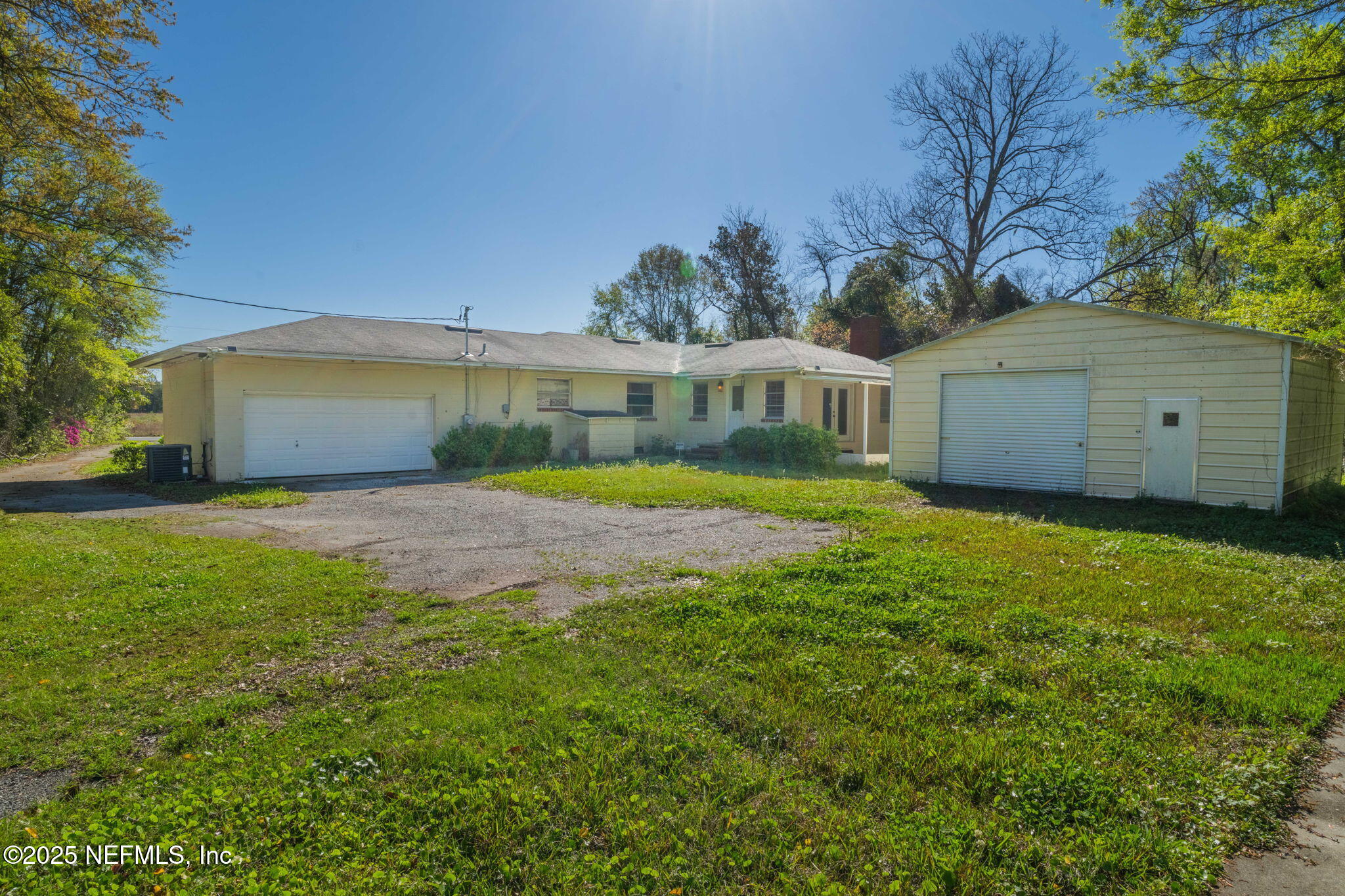 17896 Highway 16 Starke, FL 32091 - Photo 39 of 57 a view of a house with a big yard and large trees