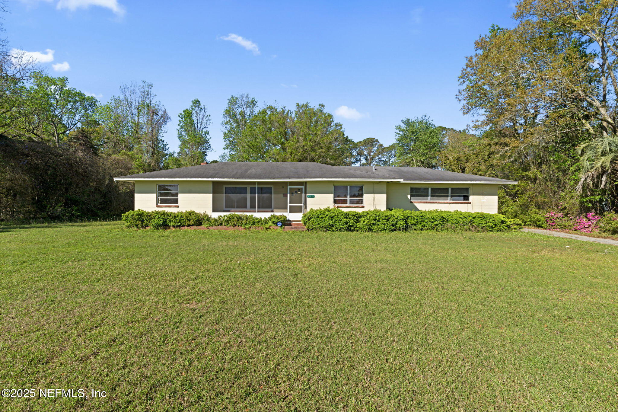 17896 Highway 16 Starke, FL 32091 - Photo 43 of 57 a front view of house with yard and trees