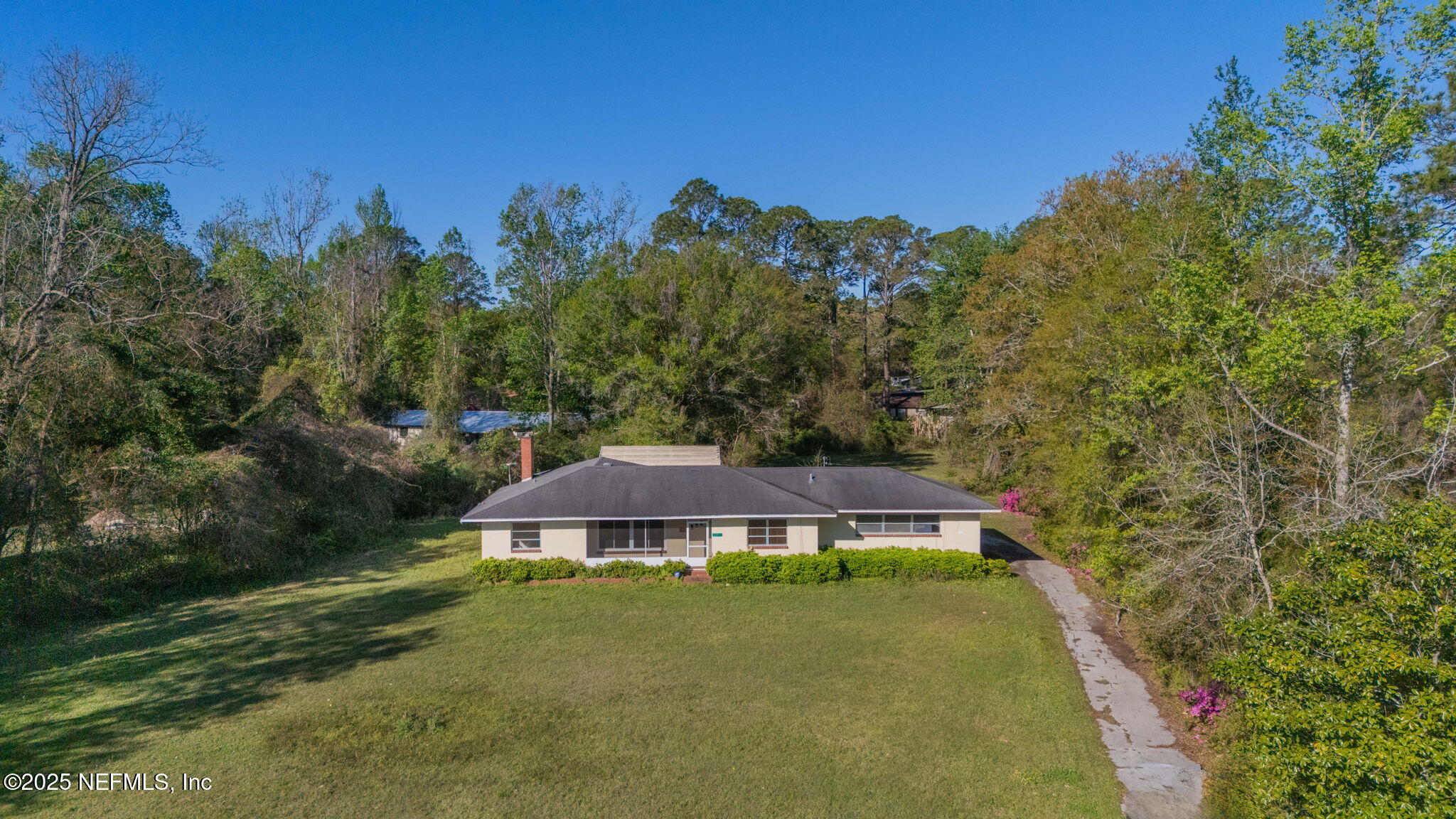 17896 Highway 16 Starke, FL 32091 - Photo 56 of 57 a view of a house with a yard and tree s
