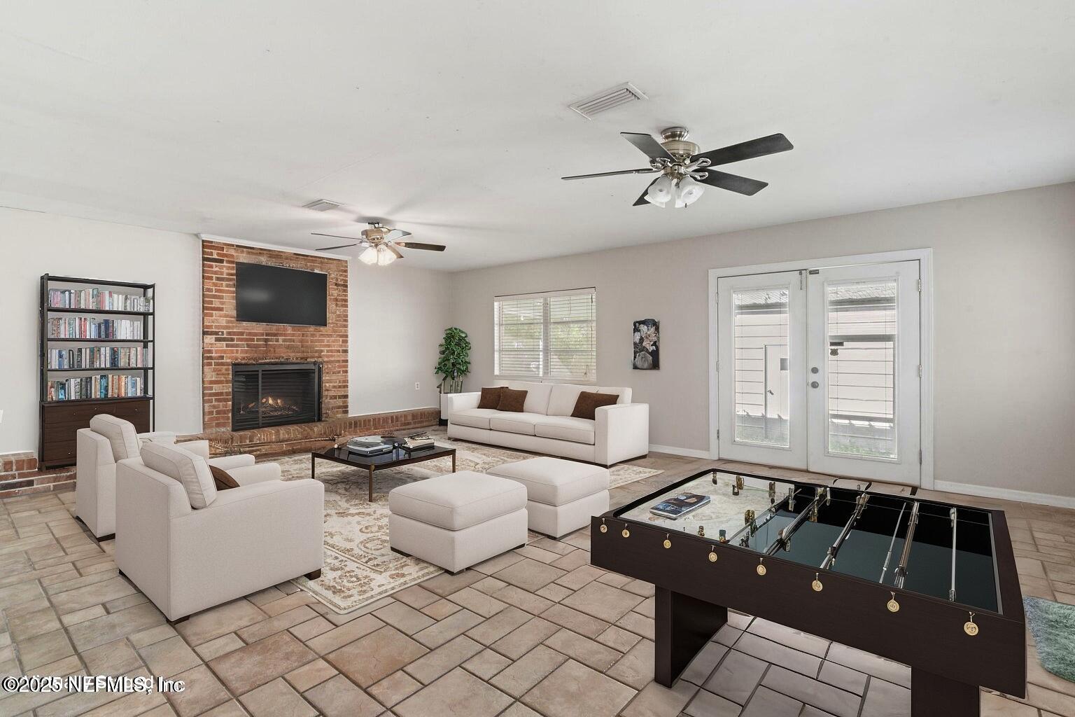 17896 Highway 16 Starke, FL 32091 - Photo 6 of 57 a living room with furniture fireplace and a window