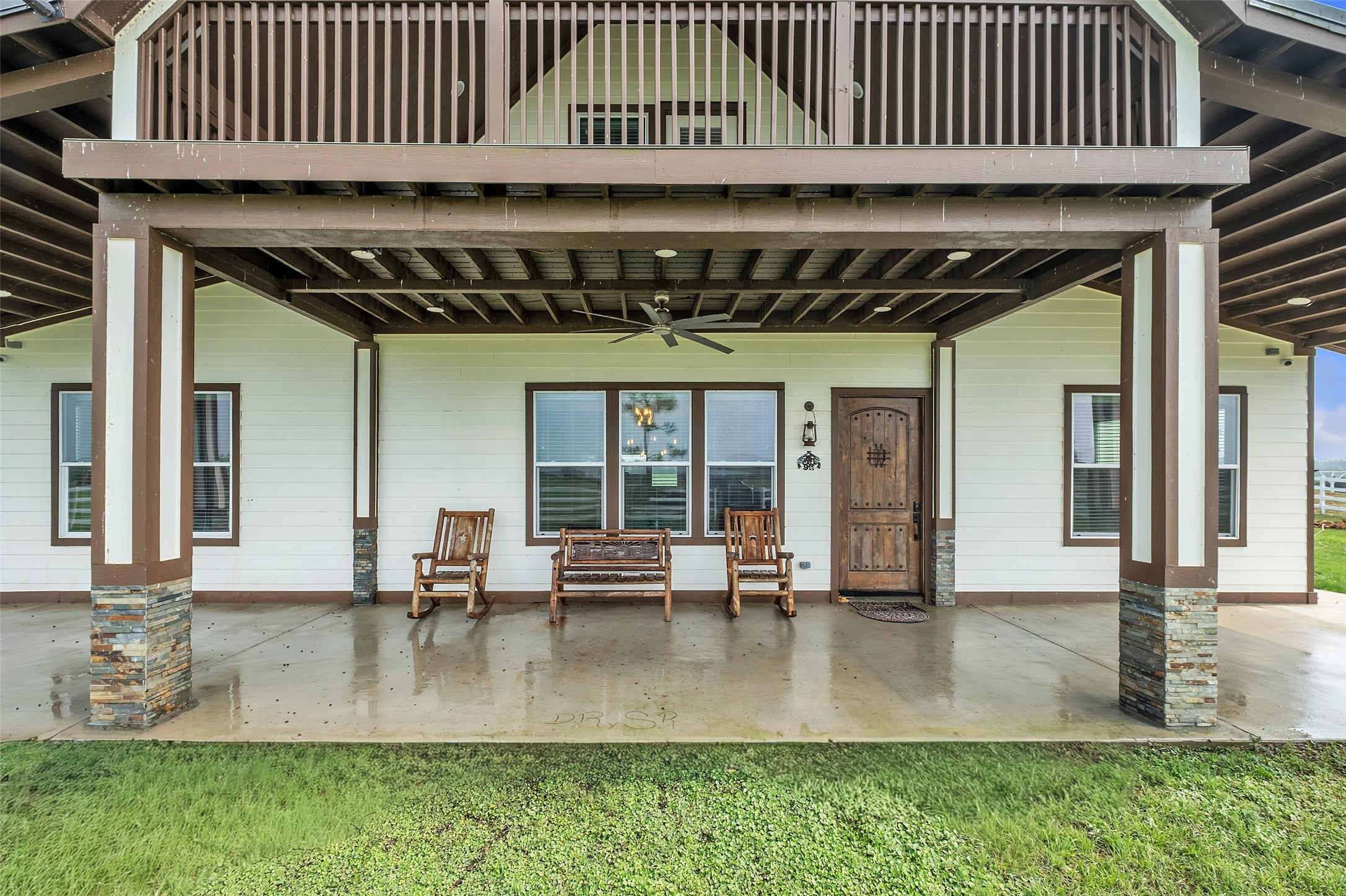 1048 11th Street Columbus, TX 78934 - Photo 6 of 48 a view of a patio with table and chairs