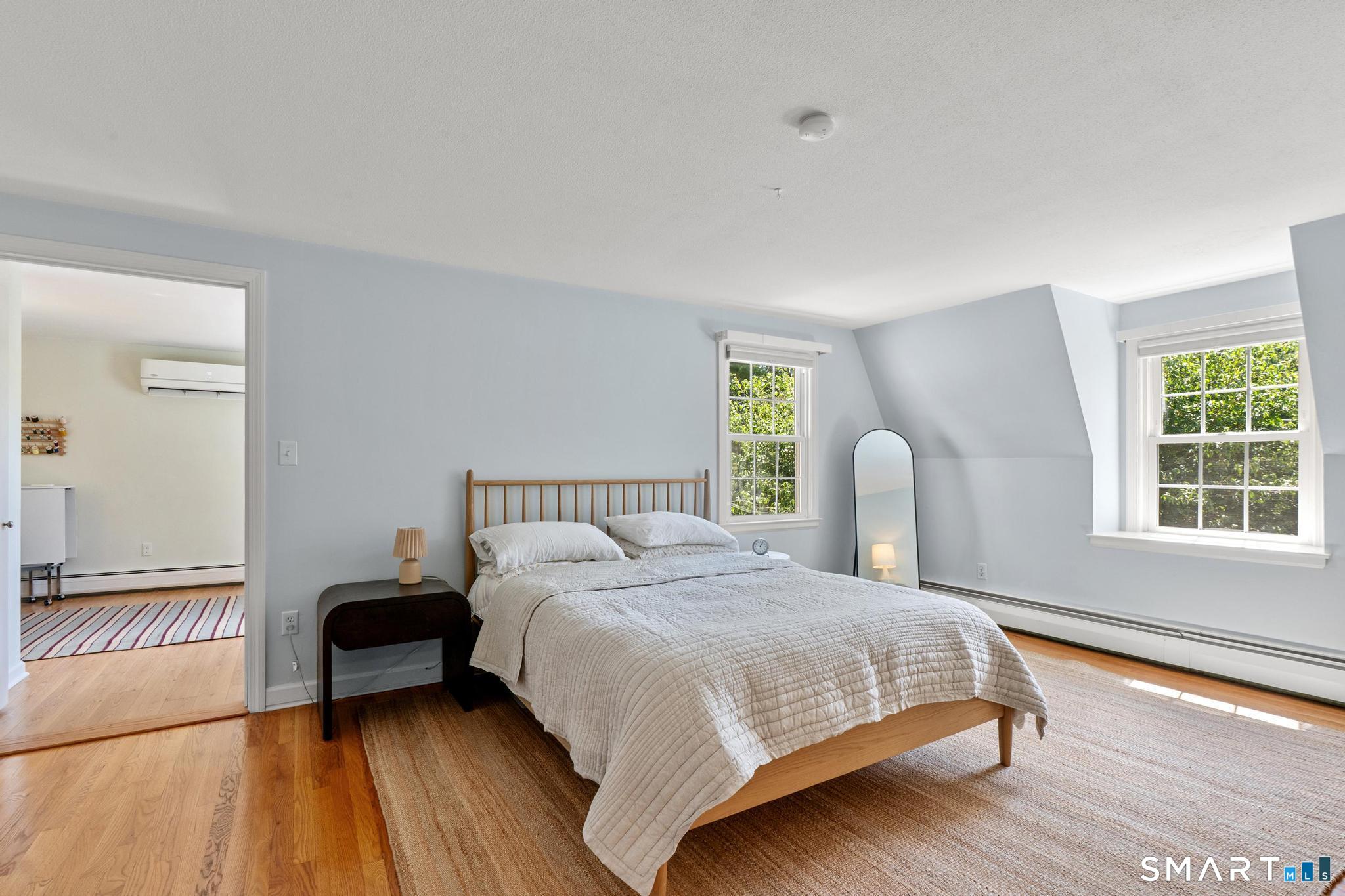 14 Richard Road Simsbury, CT 06070 - Photo 24 of 40 Spacious primary bedroom with hardwood floors