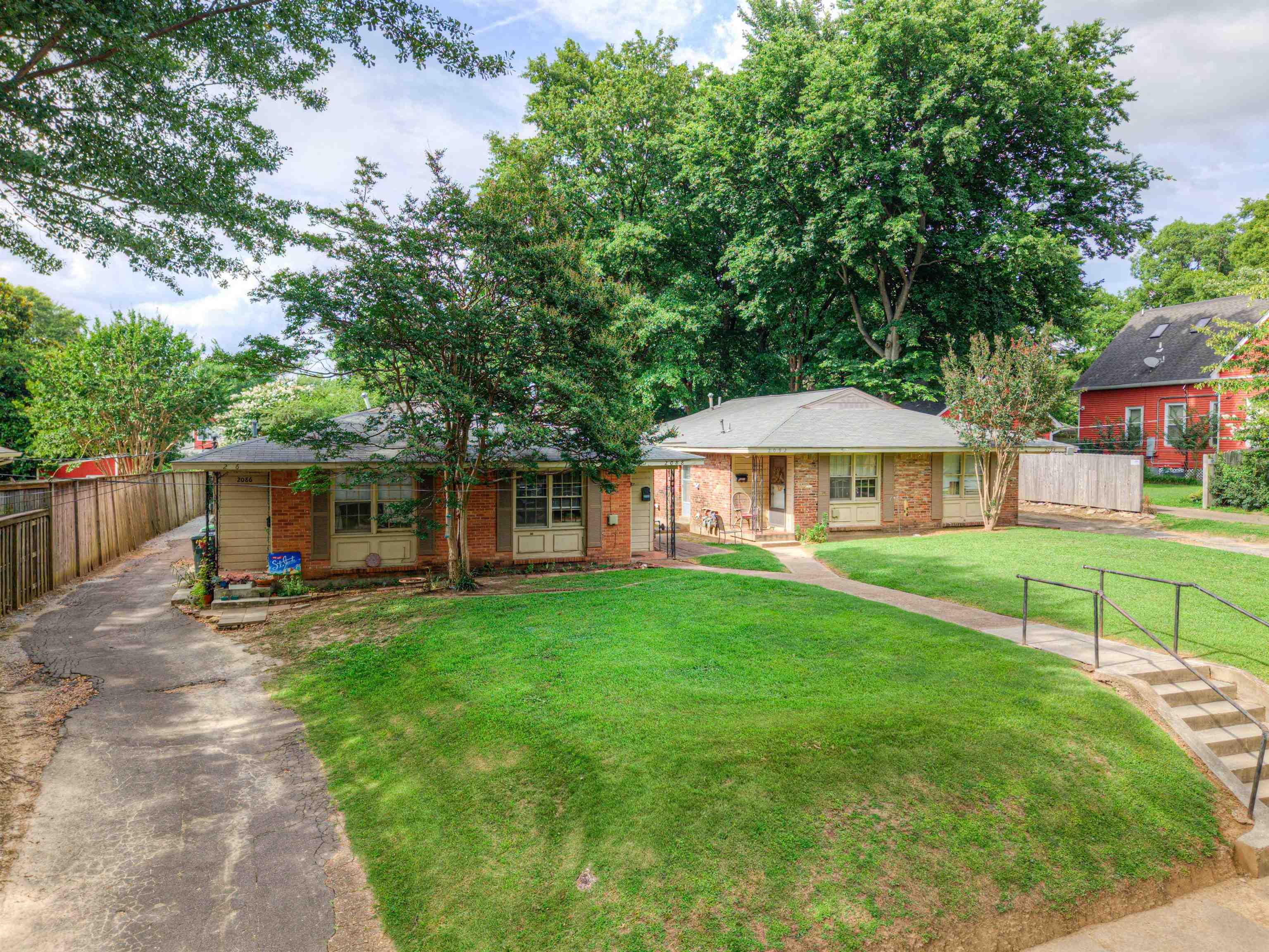 2086 Harbert Avenue Memphis, TN 38104 - Photo 3 of 16 a view of a house with a yard and sitting area