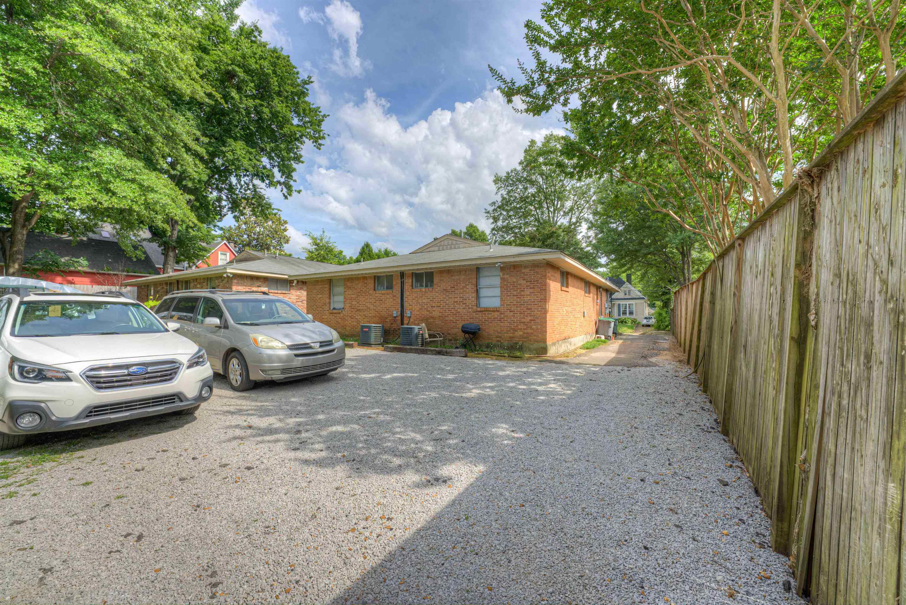 2086 Harbert Avenue Memphis, TN 38104 - Photo 8 of 16 a view of a car parked in front of a house