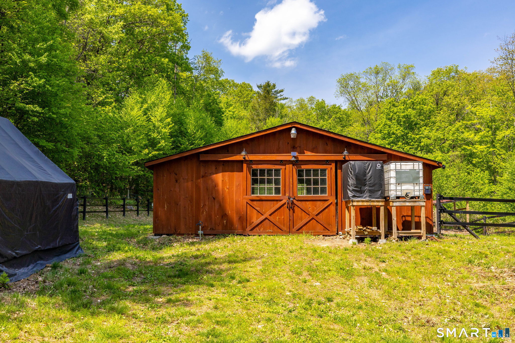 250 Center Hill Road Barkhamsted, CT 06063 - Photo 35 of 40 a front view of a house with garden