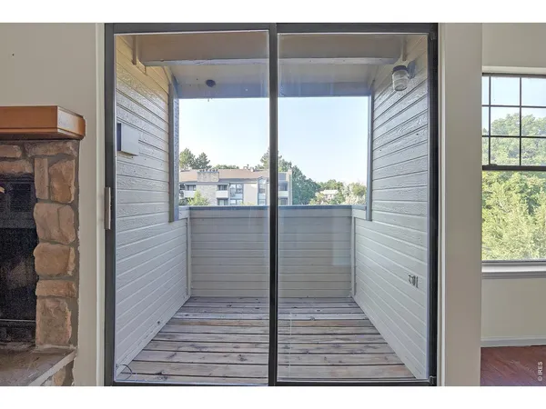 a view of a balcony from a door
