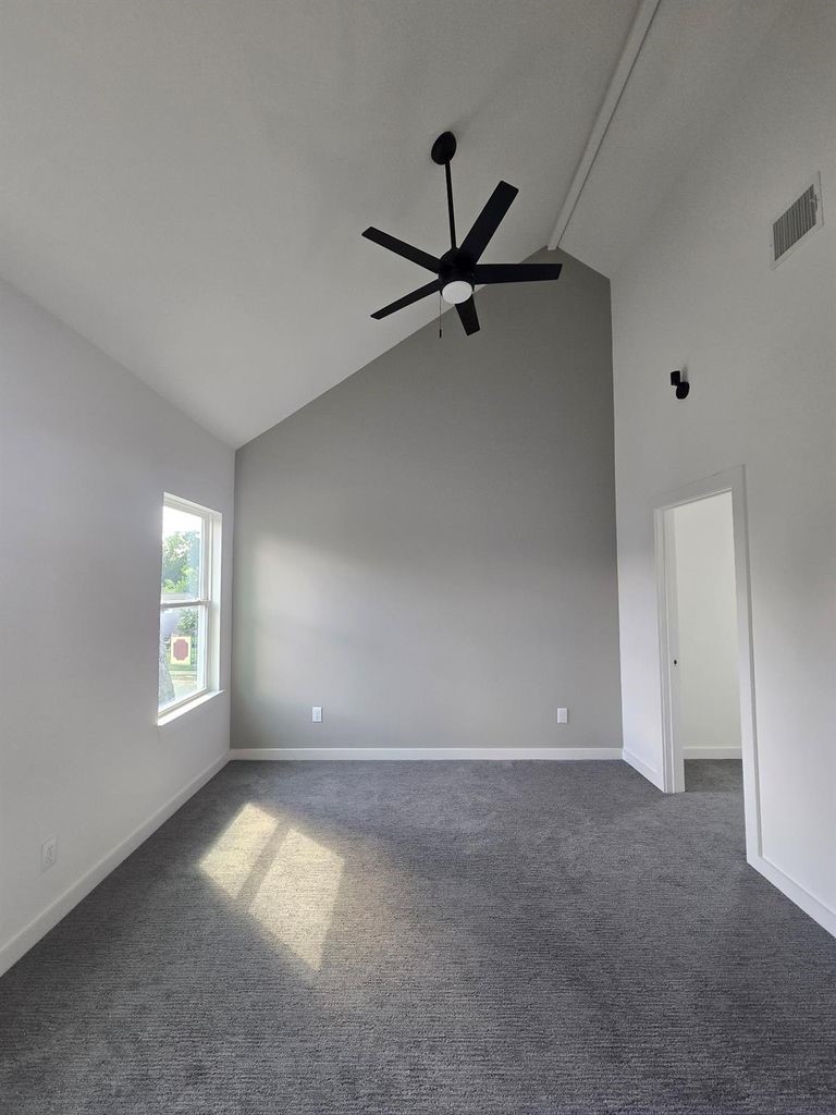 9630 Burden Street Houston, TX 77093 - Photo 12 of 15 a view of an empty room with a window