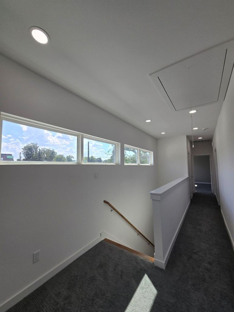 9630 Burden Street Houston, TX 77093 - Photo 7 of 15 a view of an empty room with a window