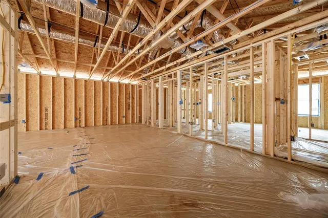 a view of a bathroom with shower and a curtain