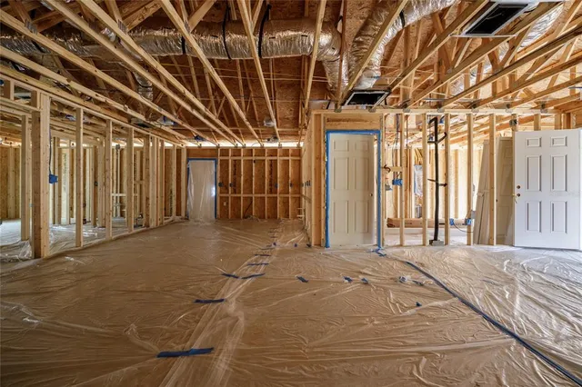 a view of a livingroom with wooden floor