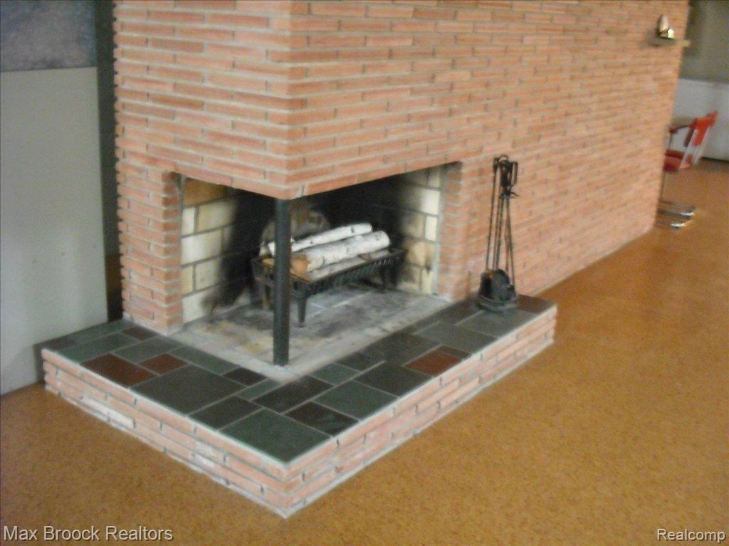 180 Boyken Road Rochester, MI 48307 - Photo 11 of 24 180 Boyken Fireplace in basement