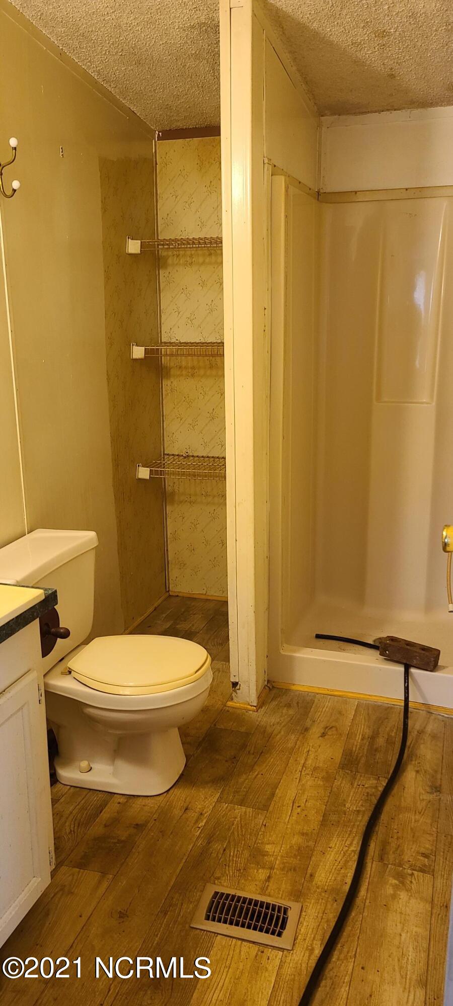 548 Newport Loop Road Newport, NC 28570 - Photo 10 of 20 "His" bathroom