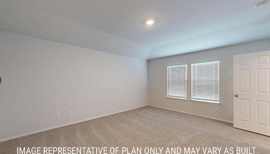 10313 Neptune Court Waco, TX 76708 - Photo 10 of 17 Spacious room featuring neutral carpeting, light-toned walls, and a tray ceiling with recessed lighting