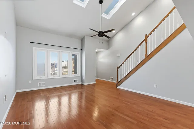 a view of an front door and wooden floor