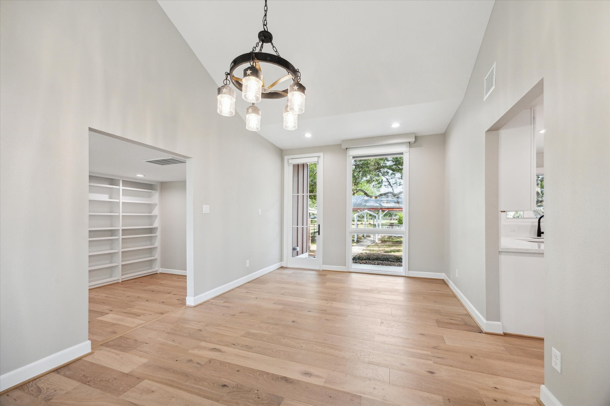 3834 Farm To Market Road 949 Cat Spring, TX 78933 - Photo 16 of 50 wooden floor in an empty room with a window