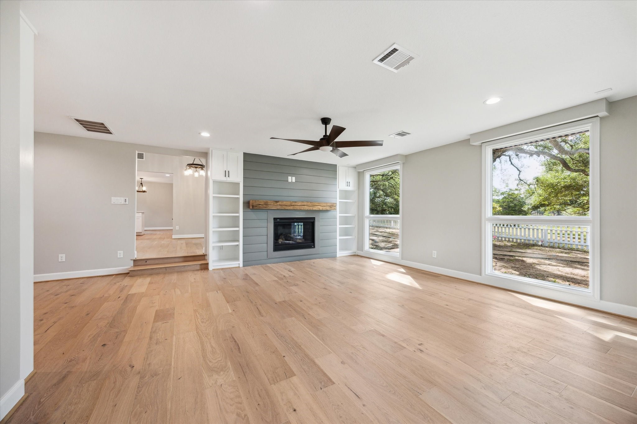 3834 Farm To Market Road 949 Cat Spring, TX 78933 - Photo 25 of 50 a view of an empty room with a fireplace and a window