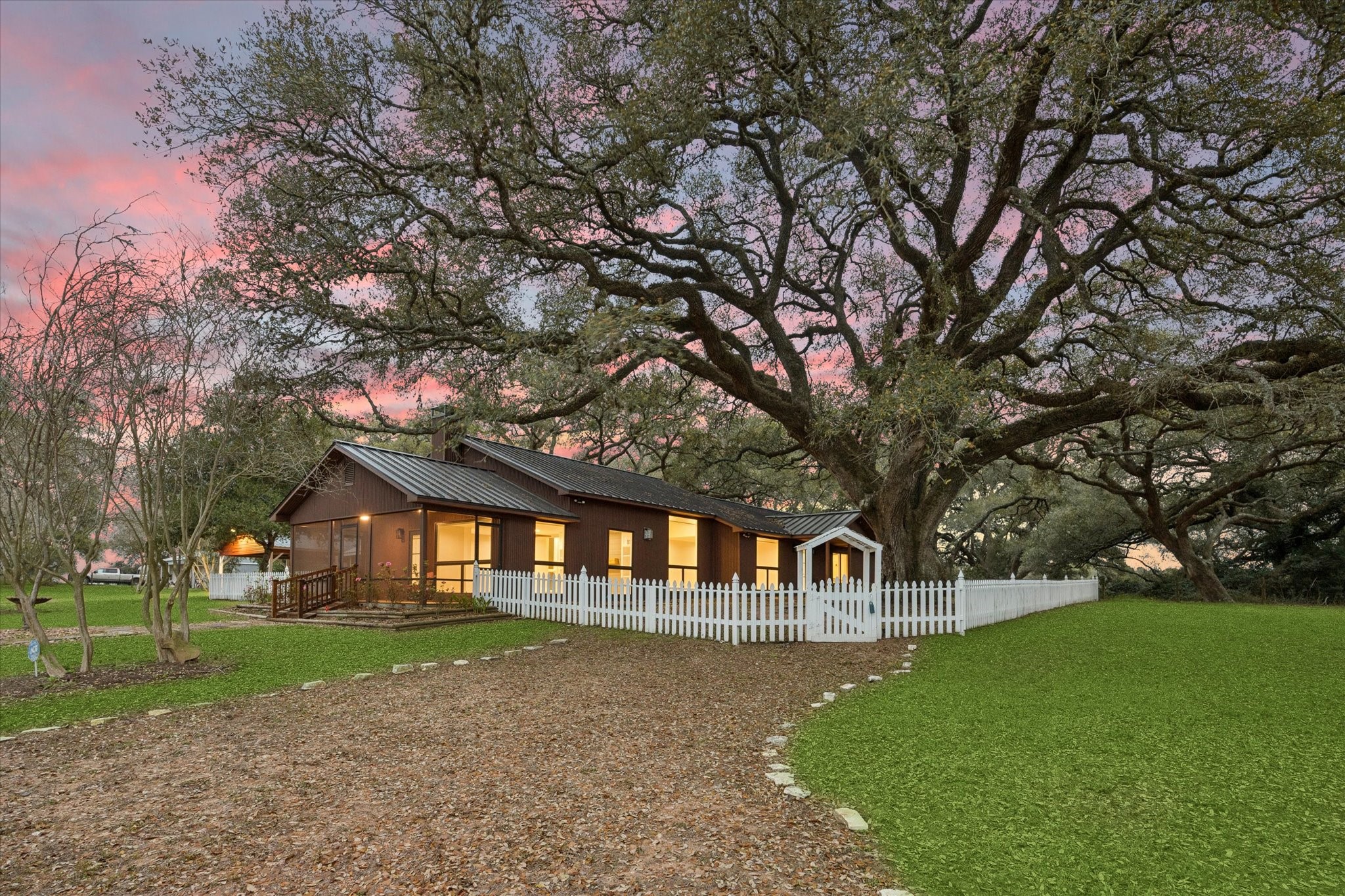 3834 Farm To Market Road 949 Cat Spring, TX 78933 - Photo 3 of 50 a front view of a house with garden