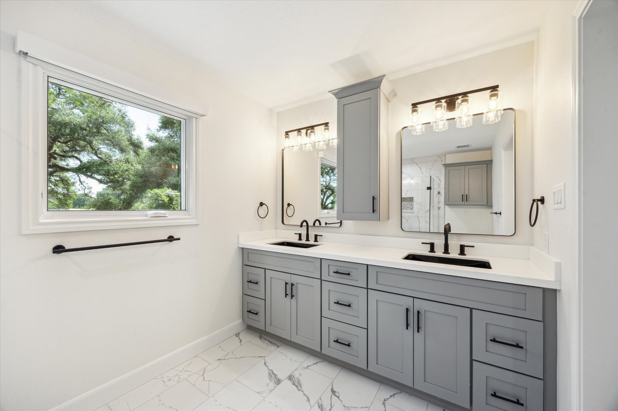3834 Farm To Market Road 949 Cat Spring, TX 78933 - Photo 34 of 50 a bathroom with a double vanity sink and mirror with window