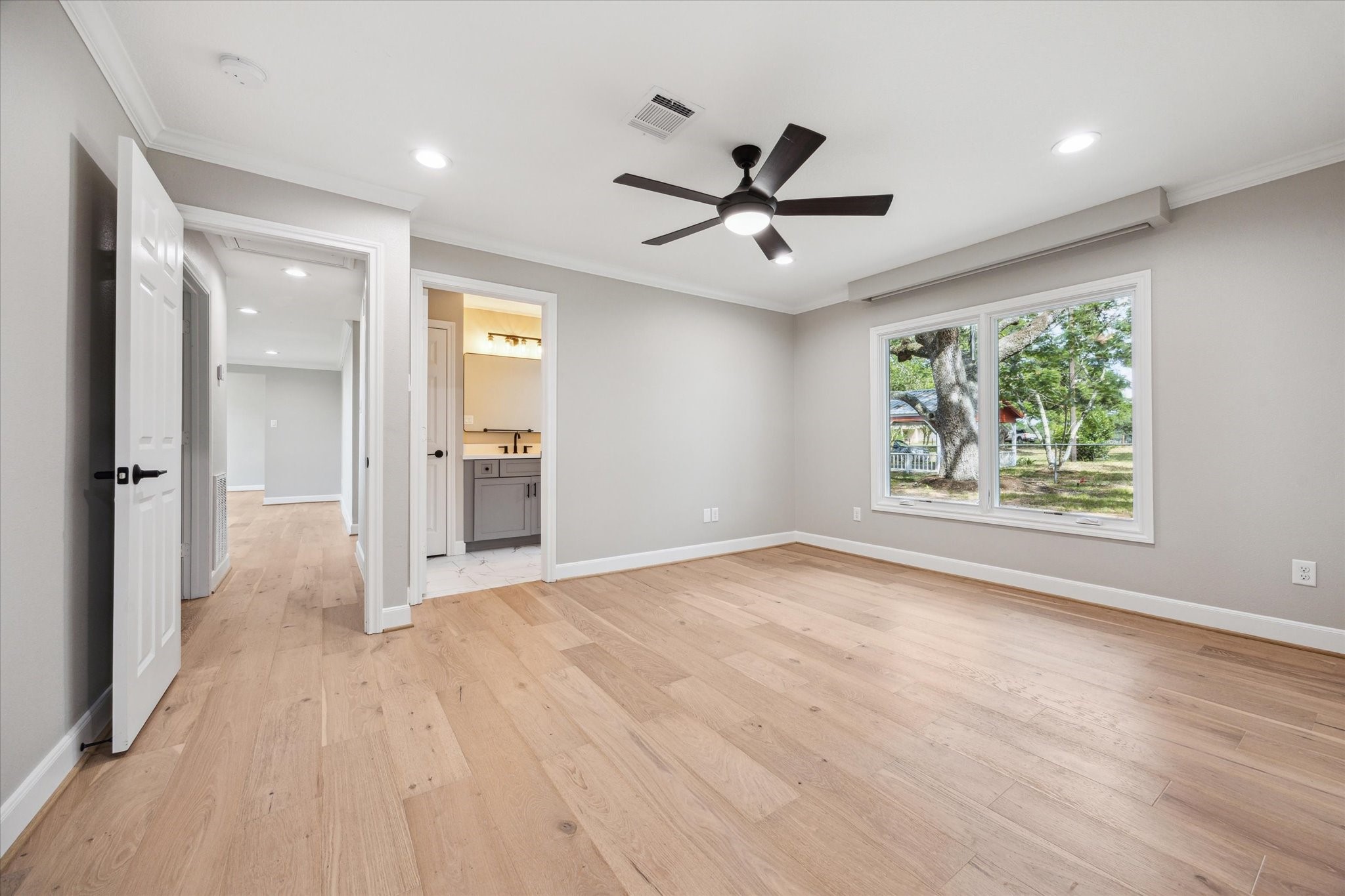 3834 Farm To Market Road 949 Cat Spring, TX 78933 - Photo 37 of 50 wooden floor in an empty room with a window