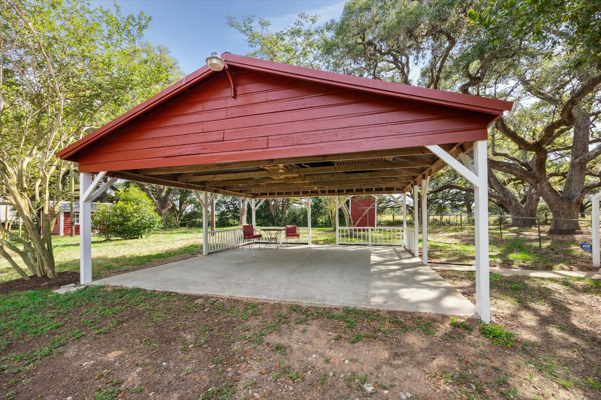 3834 Farm To Market Road 949 Cat Spring, TX 78933 - Photo 41 of 50 a view of a house with wooden deck and floor