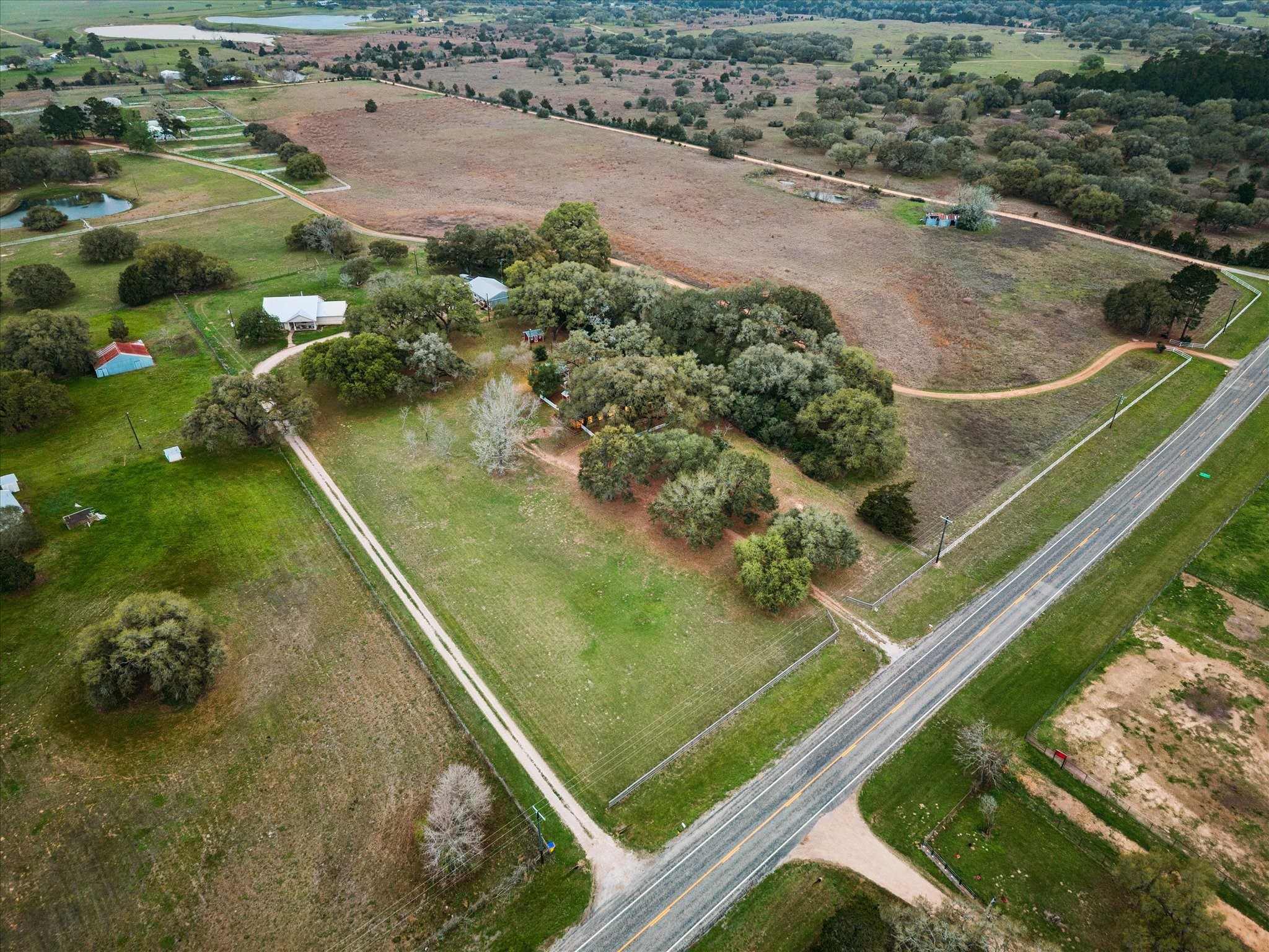 3834 Farm To Market Road 949 Cat Spring, TX 78933 - Photo 46 of 50 a view of a backyard