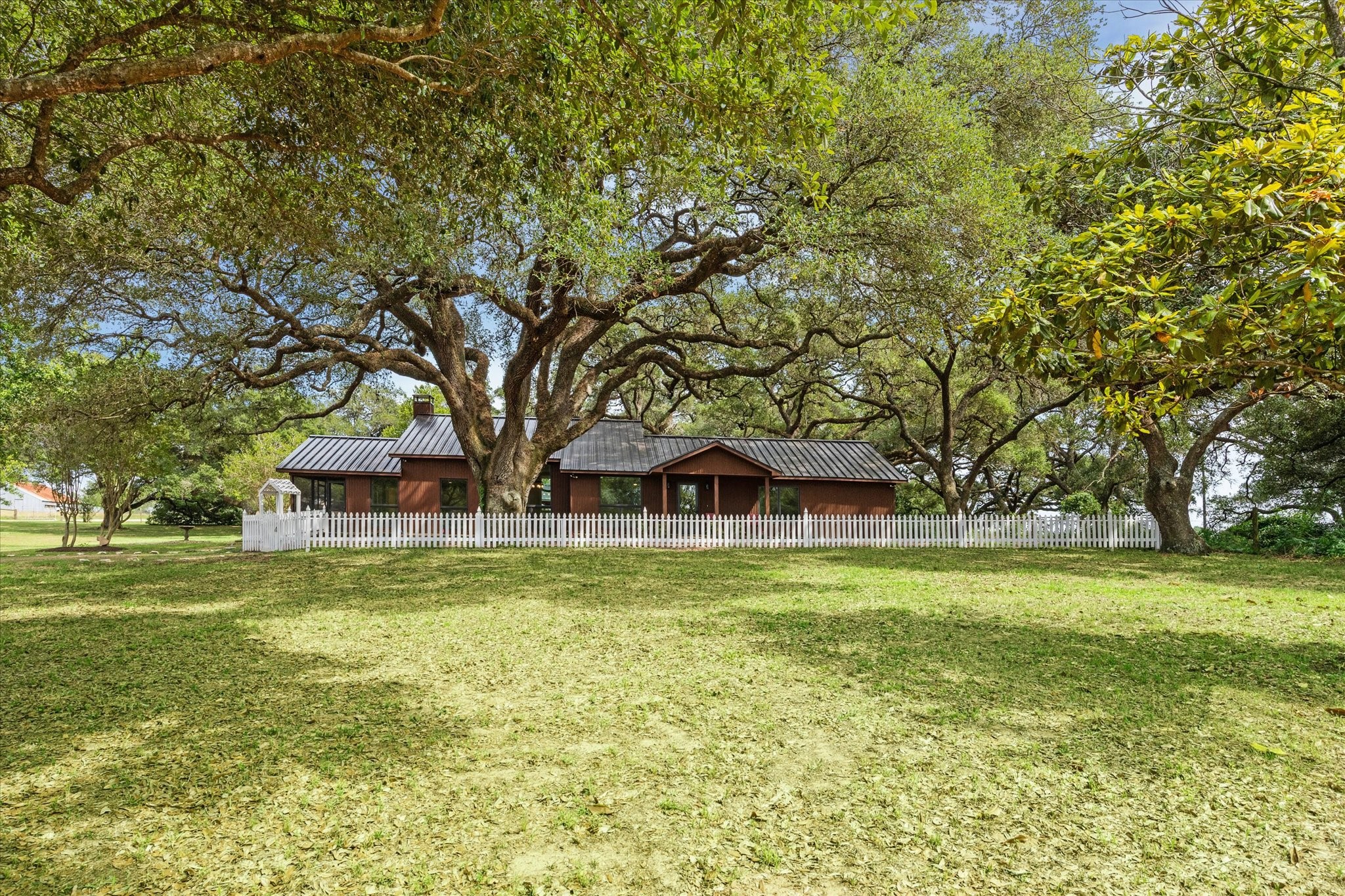 3834 Farm To Market Road 949 Cat Spring, TX 78933 - Photo 49 of 50 a front view of house with yard and green space