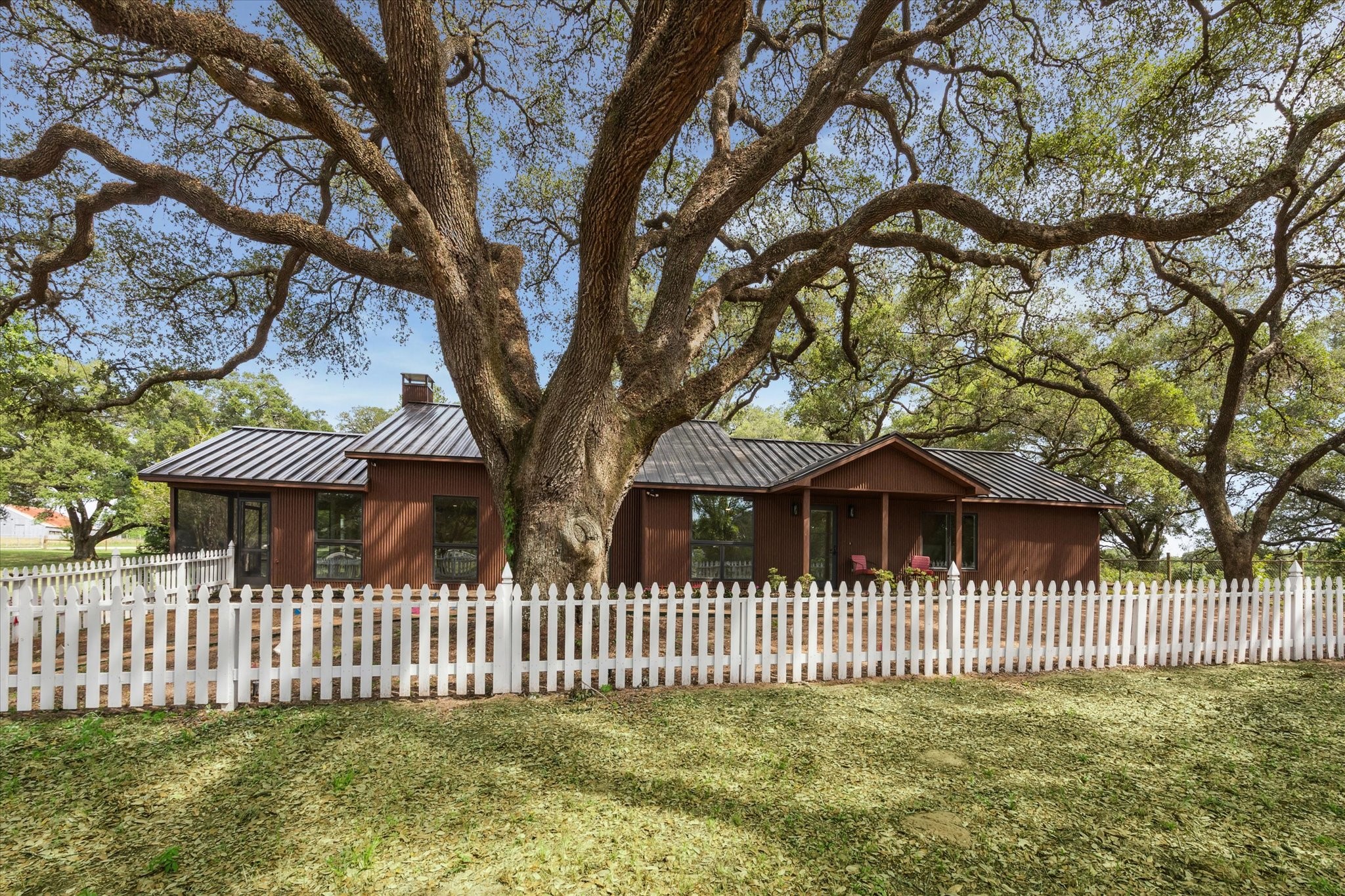 3834 Farm To Market Road 949 Cat Spring, TX 78933 - Photo 50 of 50 a front view of a house with a garden