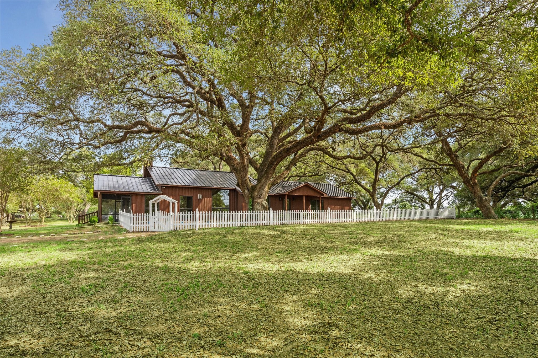 3834 Farm To Market Road 949 Cat Spring, TX 78933 - Photo 10 of 50 a view of a house with a big yard