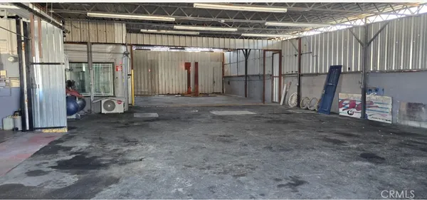 a view of a garage with wooden wall