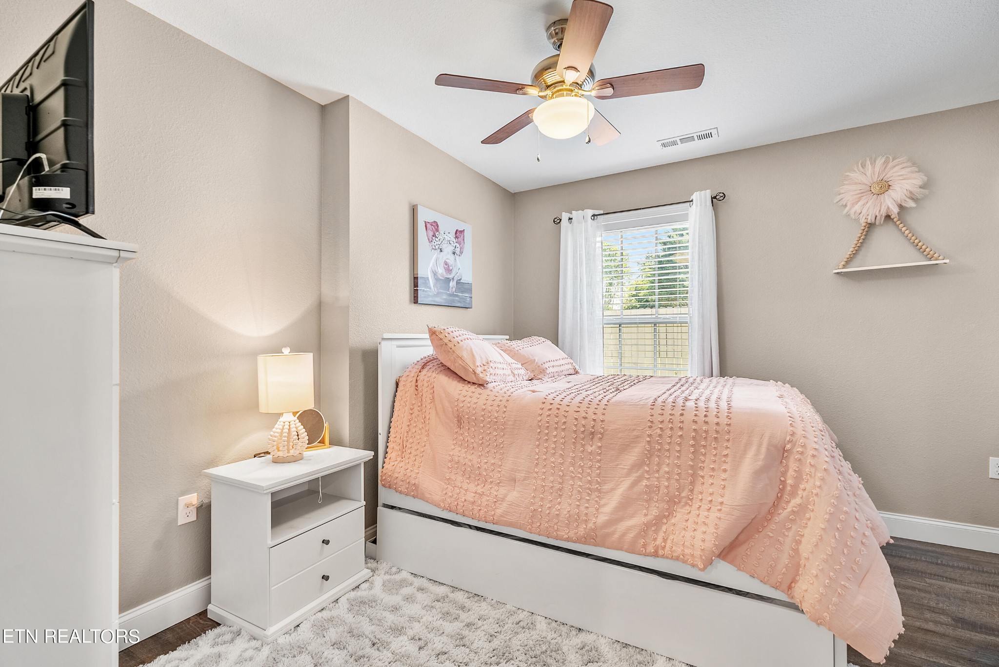 314 Two View Road Sevierville, TN 37863 - Photo 20 of 31 a bedroom with a large bed and a chandelier