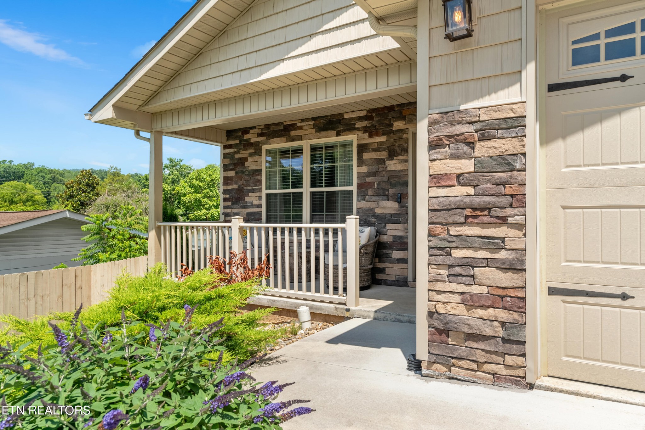 314 Two View Road Sevierville, TN 37863 - Photo 4 of 31 a front view of a house with a porch