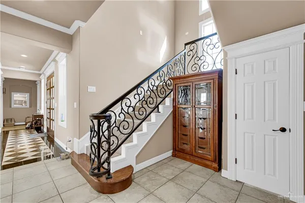 a view of an entryway with stairs