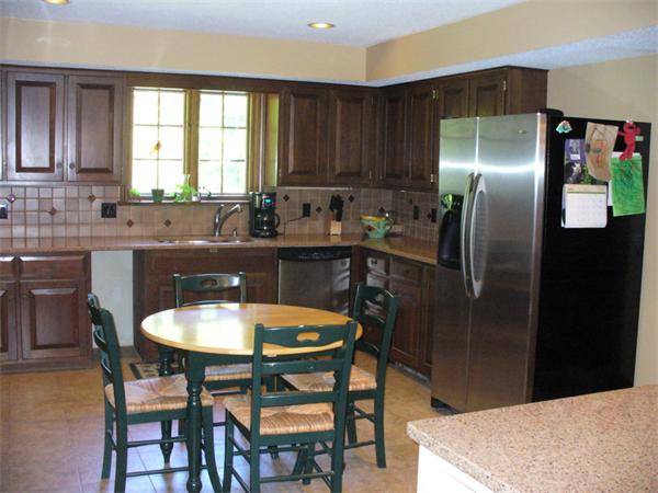 180 Reservoir Road Westhampton, MA 01027 - Photo 12 of 28 a kitchen with a table and chairs