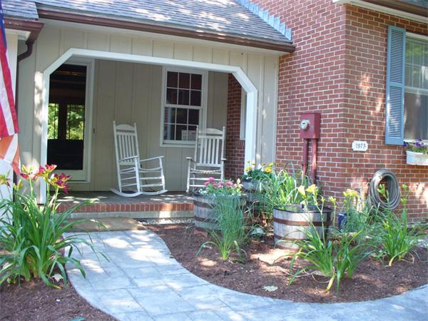 180 Reservoir Road Westhampton, MA 01027 - Photo 2 of 28 a view of a house with potted plants