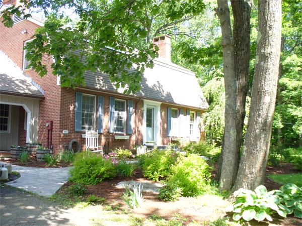 180 Reservoir Road Westhampton, MA 01027 - Photo 3 of 28 a front view of a house with a yard