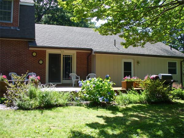 180 Reservoir Road Westhampton, MA 01027 - Photo 4 of 28 a view of a house with a garden