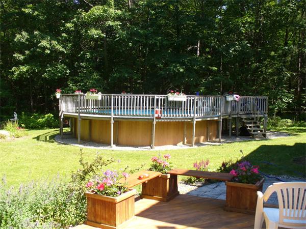 180 Reservoir Road Westhampton, MA 01027 - Photo 5 of 28 a view of a house with swimming pool and sitting area