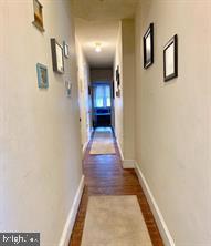 419 Green Lane, Unit 3 Philadelphia, PA 19128 - Photo 14 of 32 a view of a hallway with wooden floor and staircase