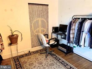 419 Green Lane, Unit 3 Philadelphia, PA 19128 - Photo 18 of 32 a view of a workspace with furniture and a window