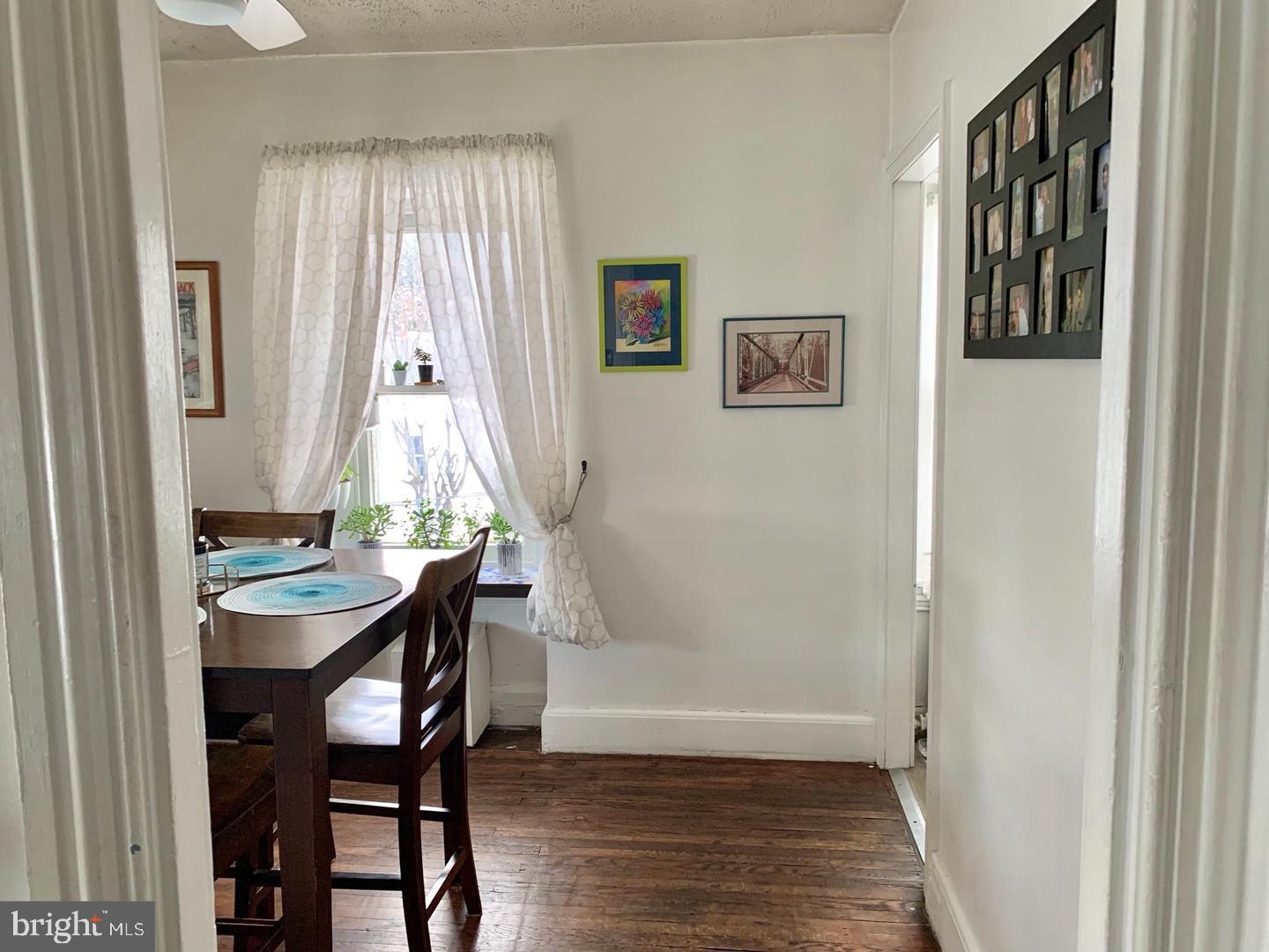 419 Green Lane, Unit 3 Philadelphia, PA 19128 - Photo 20 of 32 a dining room with furniture and window