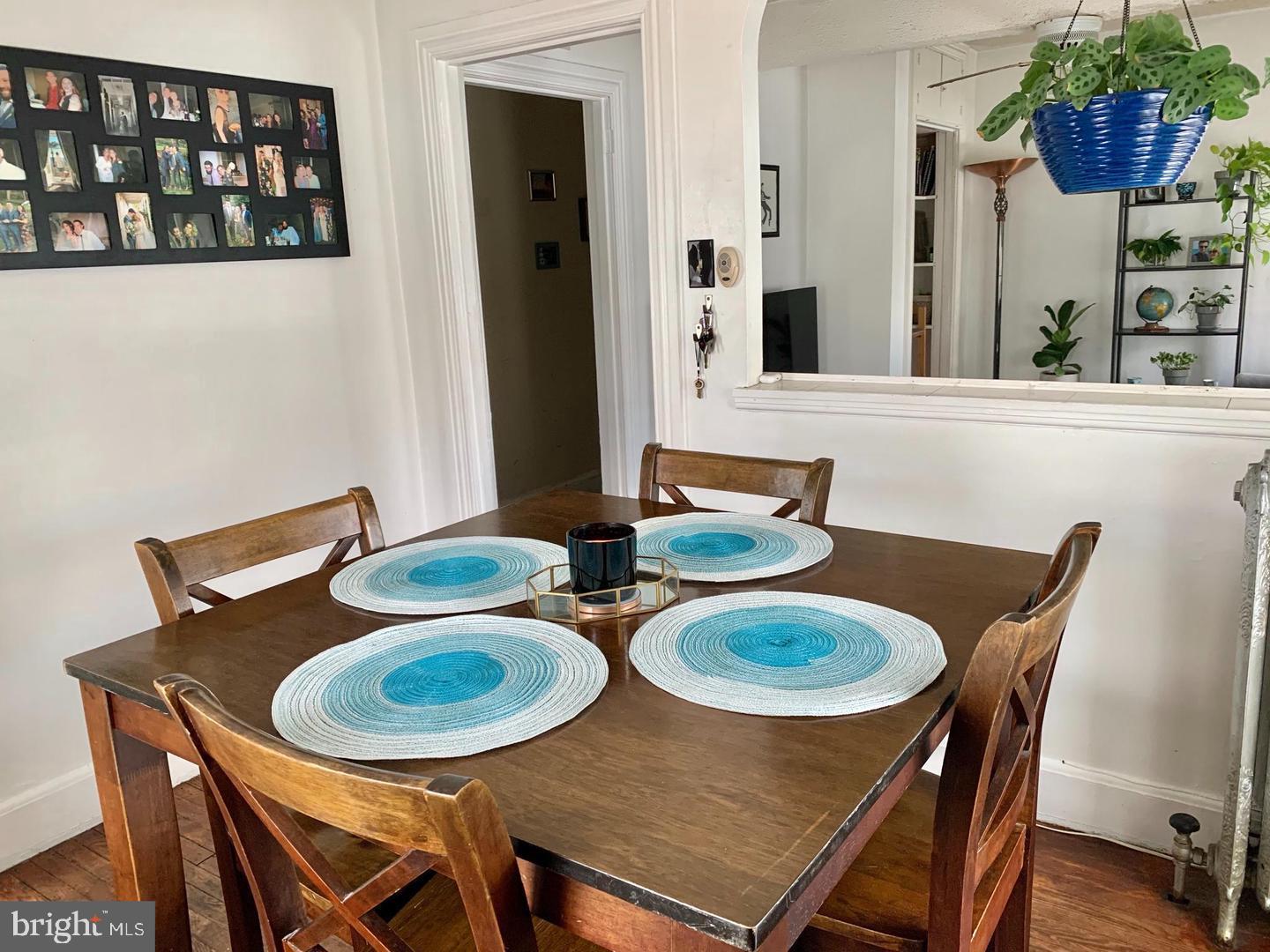 419 Green Lane, Unit 3 Philadelphia, PA 19128 - Photo 21 of 32 a view of a dining room with furniture and wooden floor