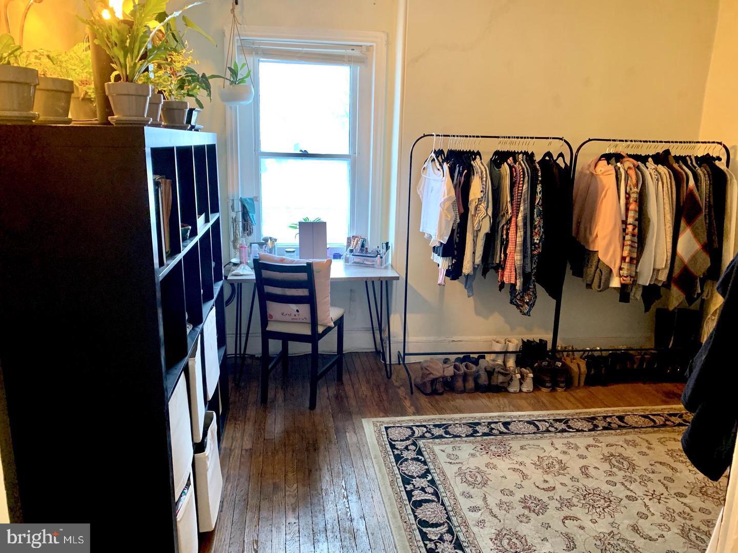 419 Green Lane, Unit 3 Philadelphia, PA 19128 - Photo 23 of 32 a view of walk in closet with clothes and shoes