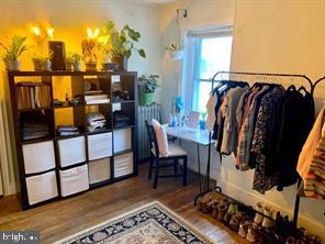 419 Green Lane, Unit 3 Philadelphia, PA 19128 - Photo 30 of 32 a view of walk in closet with clothes and shoes