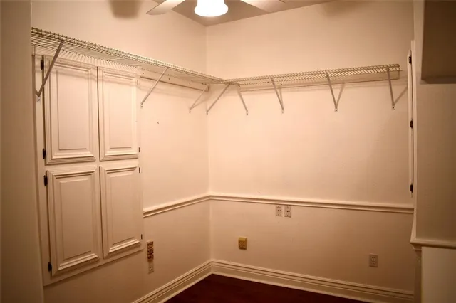 a view of an empty walk in closet