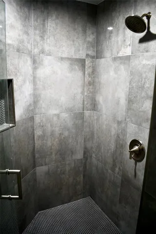 a bathroom with a sink and a shower