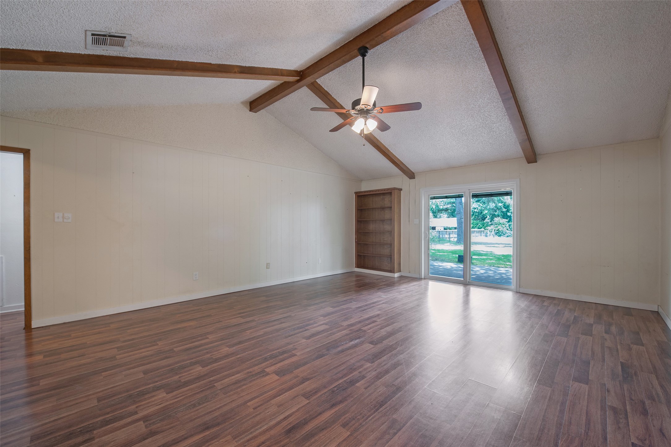 504 Walnut Street Waller, TX 77484 - Photo 6 of 35 Large Family Room with Cathedral Ceiling with Access to Backyard