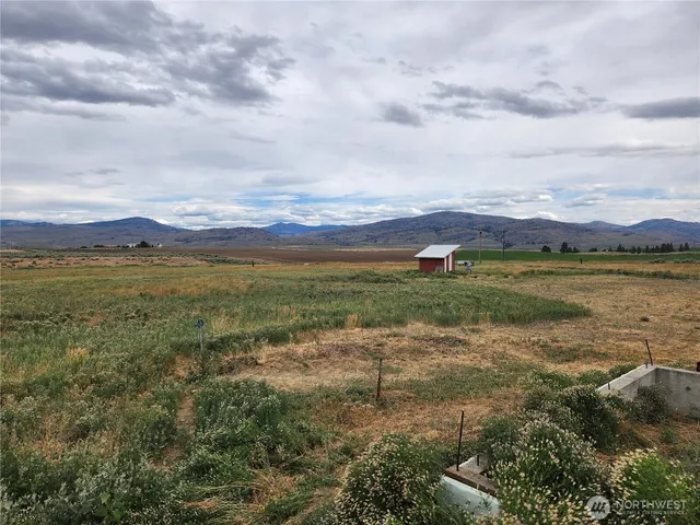 a view of a lake with a mountain in the background