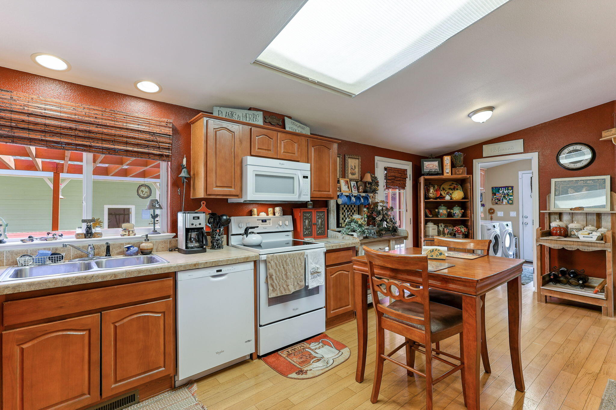 551 Lewiston Road Lewiston, CA 96052 - Photo 13 of 51 a kitchen with a sink and chairs