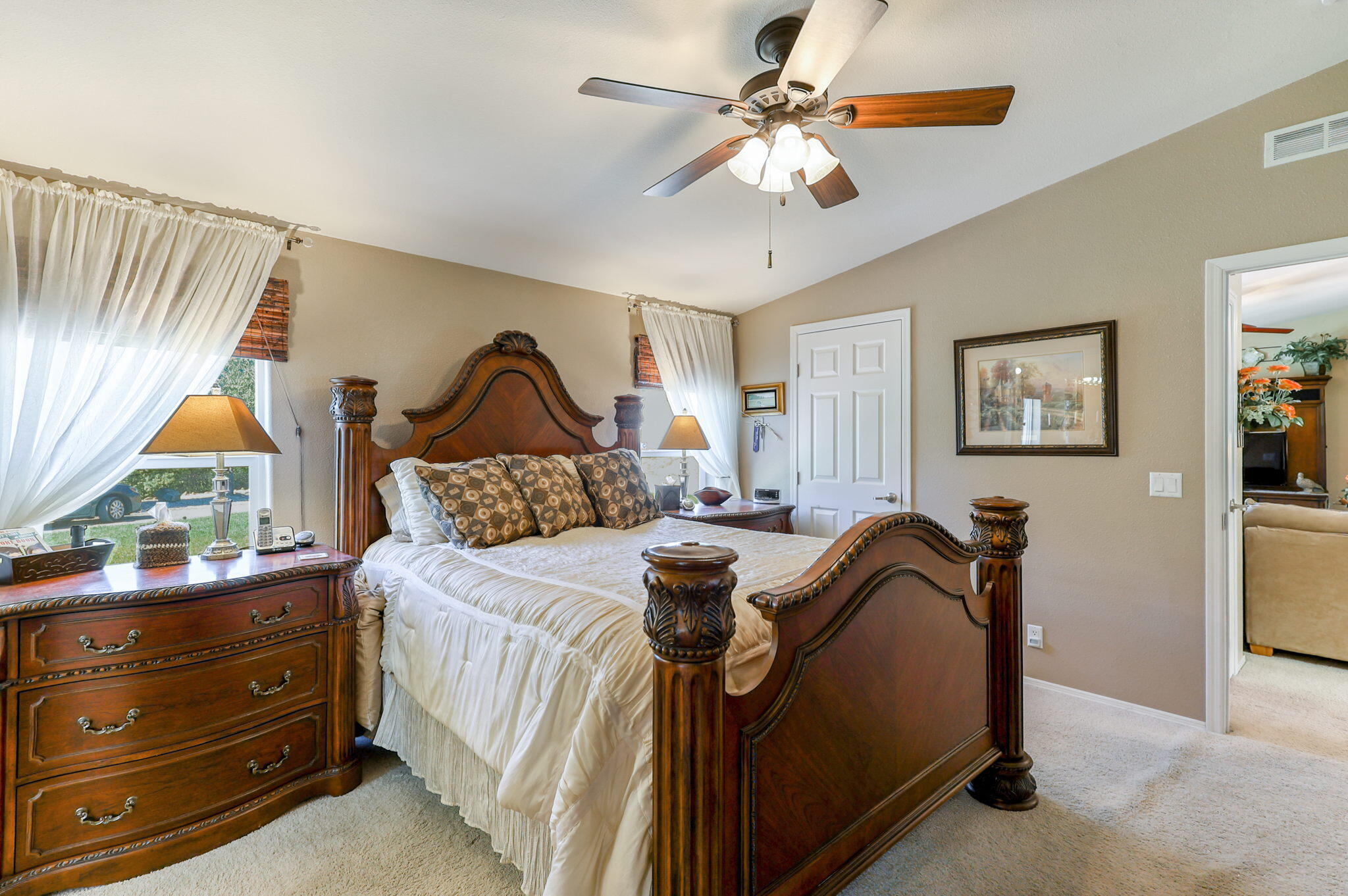 551 Lewiston Road Lewiston, CA 96052 - Photo 19 of 51 a bedroom with a bed and a chandelier
